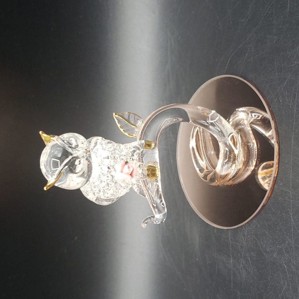 Spun glass owl on a pink mirror base